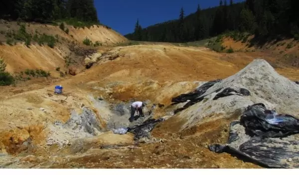 Scientist Keith Morrison working in a mineral deposit