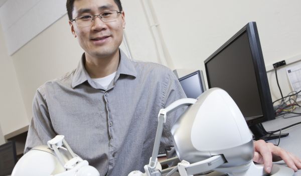 Henry Fu with simulation device