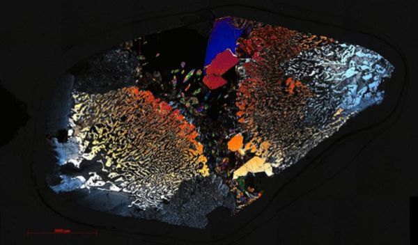 A photomicrograph mosaic of rocks beneath the ocean floor.