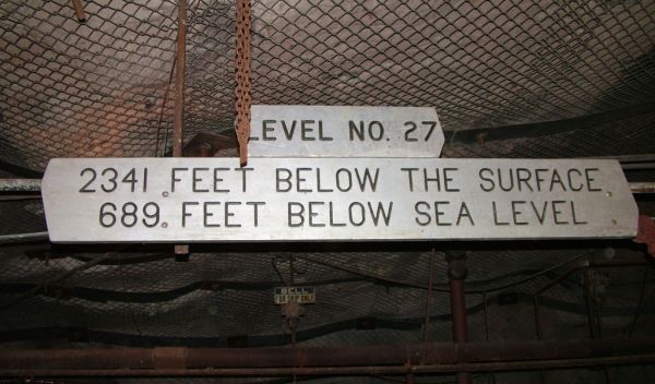 A sign that says Level number 27, 2,341 feet below the surface, 689 feet below sear level