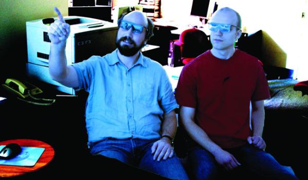 Photo of 2 researchers wearing 3-D glasses.