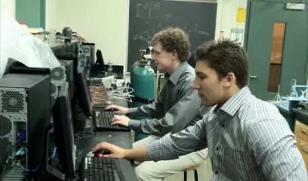Students at Merrimack College in a computer lab performing virtual HIV screens