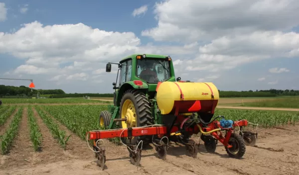 tractor  in a corn field at the NSF Kellogg Biological Station LTER site.
