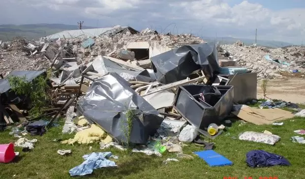 Remains of steel lockers and beds lie amidst other debris from the Celtiksuyu Boarding School.
