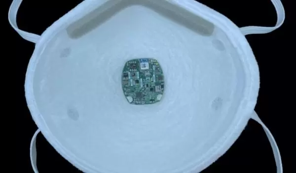 About the size of a quarter, FaceBit clips onto any mask with a small magnet.