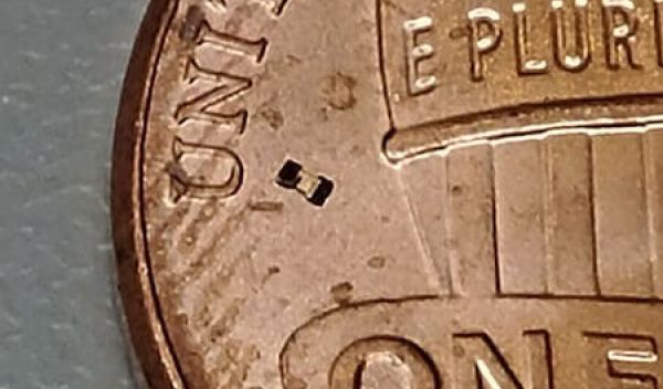 the microrobot can be seen just to the right of the âUâ in United States