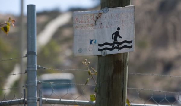 Placards posted in the Tijuana River Valley
