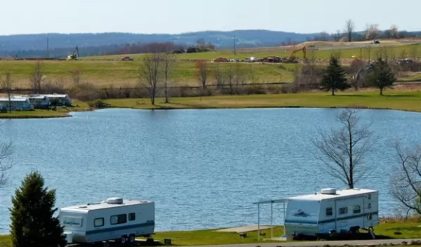 campers around a pond