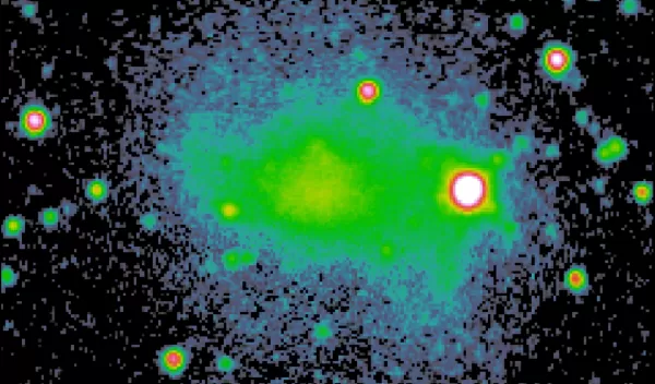 Color-enhanced optical image of the galaxy DDO 87 in the constellation Ursa Major showing stars.