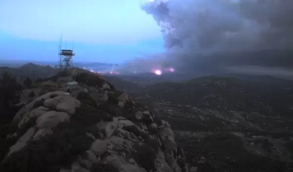 Photo of an image of a fire captured by an HPWREN automated digital camera on Lyons Peak.