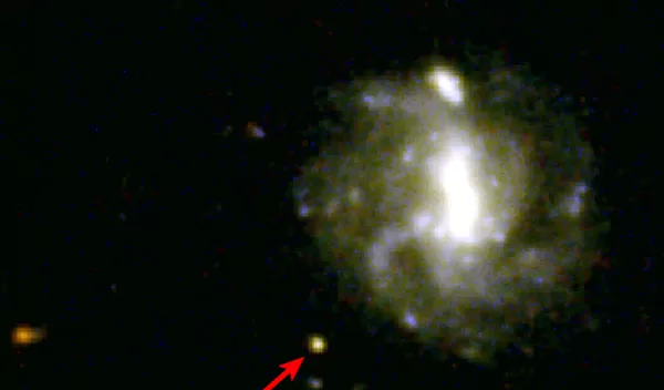 a newly confirmed kilonova (red arrow)