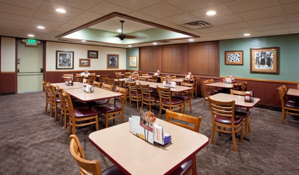 a dining room of a Denny's restaurant illuminated with Cree LR6 LED downlights.