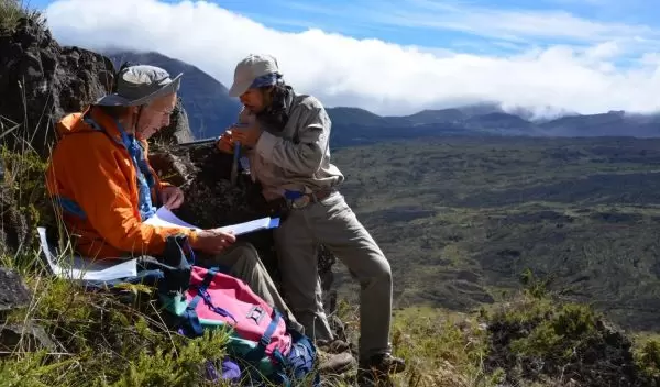 Rob Coe and Trevor Duarte orienting cores from a lava flow site