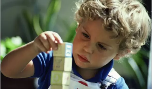 Language helps babies learn spatial relationships such as "in" and "on."