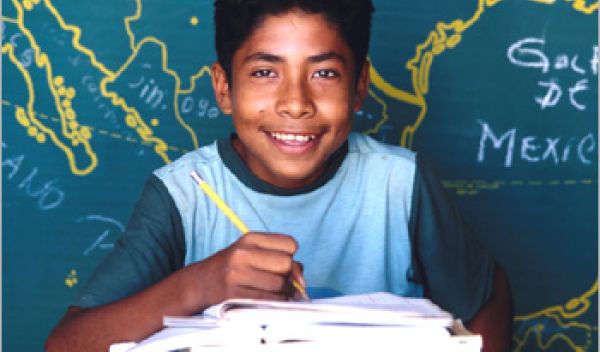Boy in front of map.