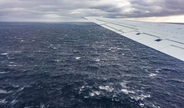 The view from a DC-8 research aircraft near where the ocean affects processes like cloud formation.