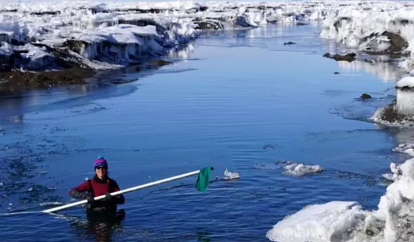 Alison Banwell in Antarctic meltwater