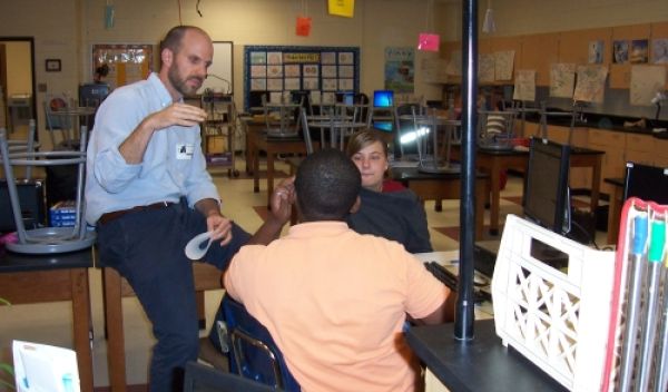 Goodall with two students he mentored