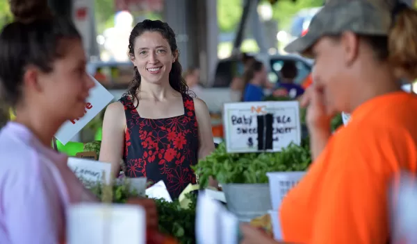 Robin Dodsworth and people at a market