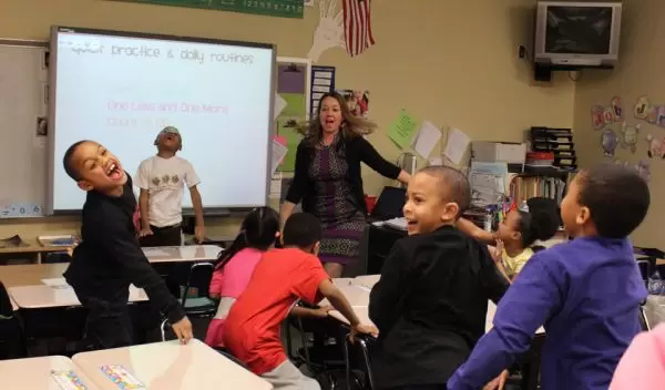 Math coach working with students