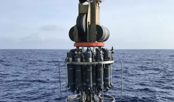 researchers retrieve water samples