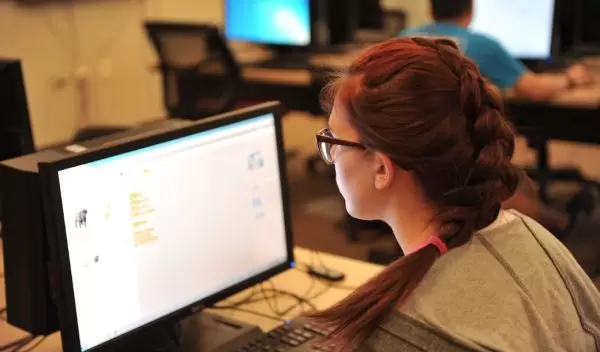 woman in front of a computer