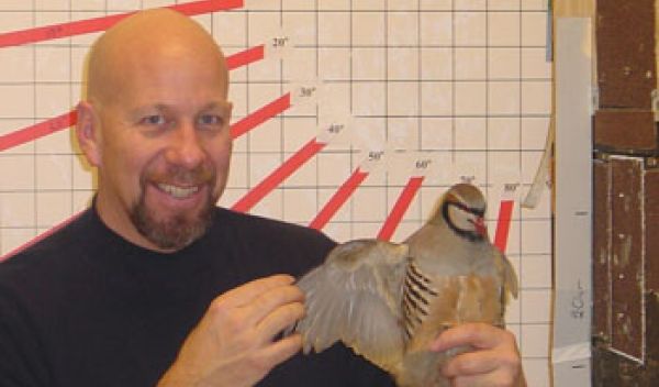 Ken Dial with an adult chukar partridge