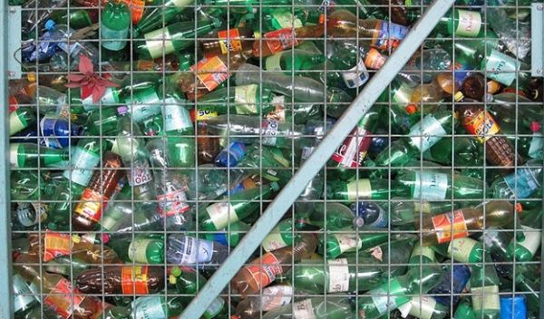 A bunch of plastic bottles in a collection