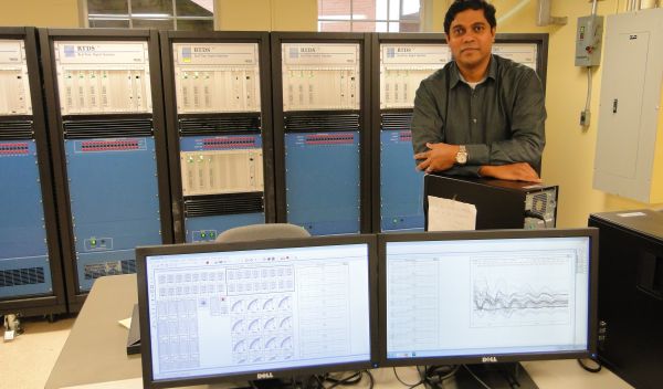 G. Kumar Venayagamoorthy in his lab, surrounded by computers