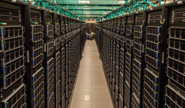 view between two rows of Frontera servers in the TACC data center