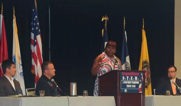 Photo of Kara Hayes, Wounded Warrior, presenting a Transition Success Story.