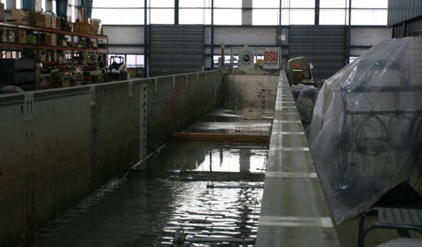 Photo of the Seawall experiment in the Large Wave Flume at Oregon State University.