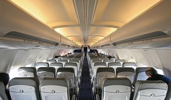 passengers seated on airplane