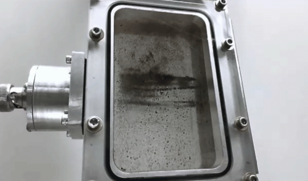 animation showing hydrocarbons clump together and rise through water during purification