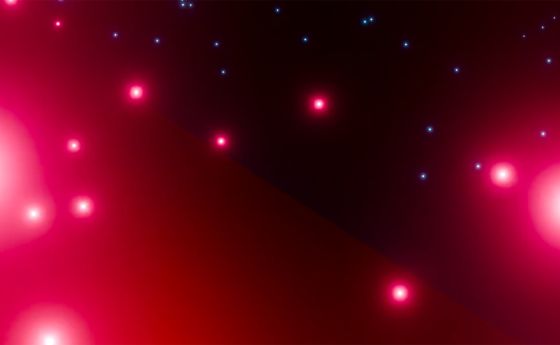Red and blue particles against a dark background.