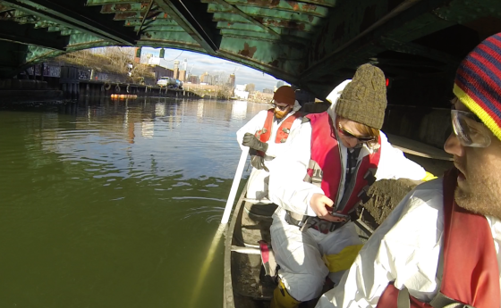 A research team takes a boat down Brooklyn's Gowanus Canal to take samples.