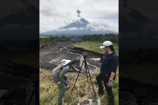 Researchers set up mudflow monitoring equipment in the shadow of Fuego volcano in Guatemala.