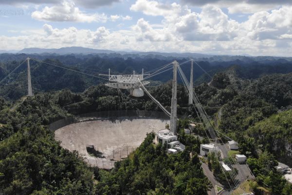 The 900-ton instrument platform at Arecibo Observatory's 305-meter telescope hanging 405 feet above the telescope's dish.